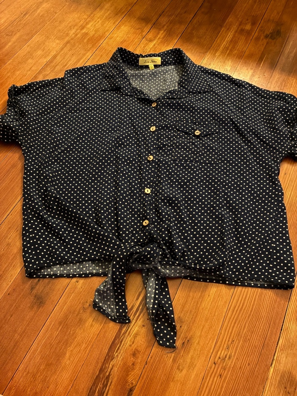 Navy blouse with white polka dots